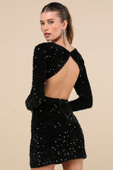 Strutting around in this sexy lace dress will make any night a compliment-filled one, as the bodycon fit offers the most flattering effect. Sheer long sleeves frame a plunging V-neckline that effortlessly boosts your confidence, while a scalloped min